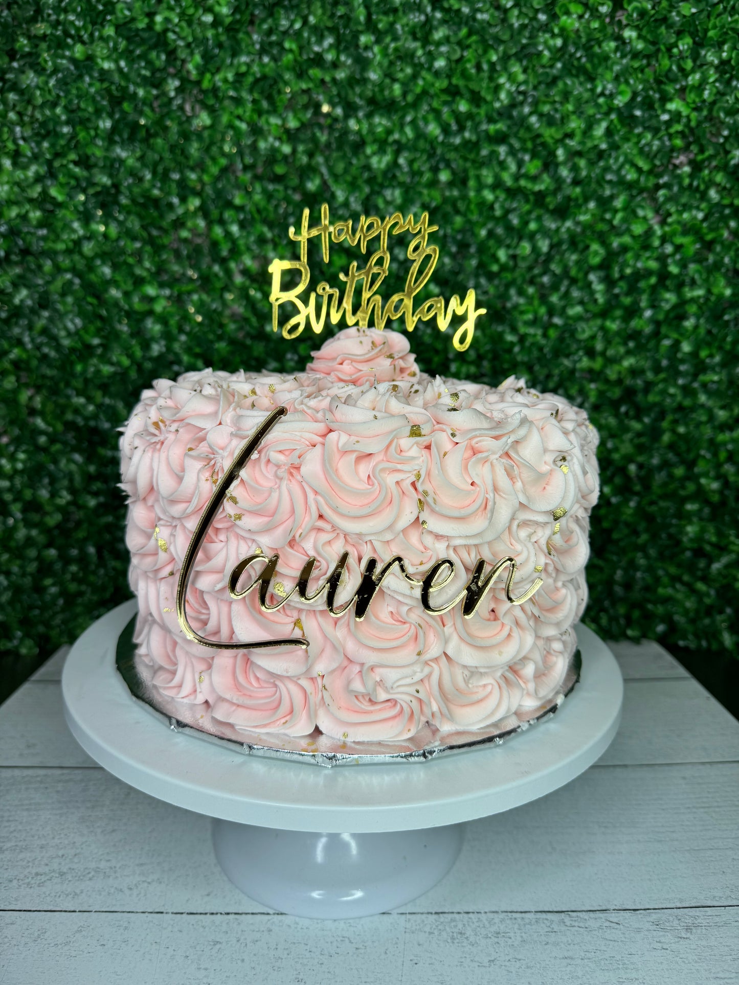 Best pink rosette cake with birthday topper and custom message in Oxford, MS