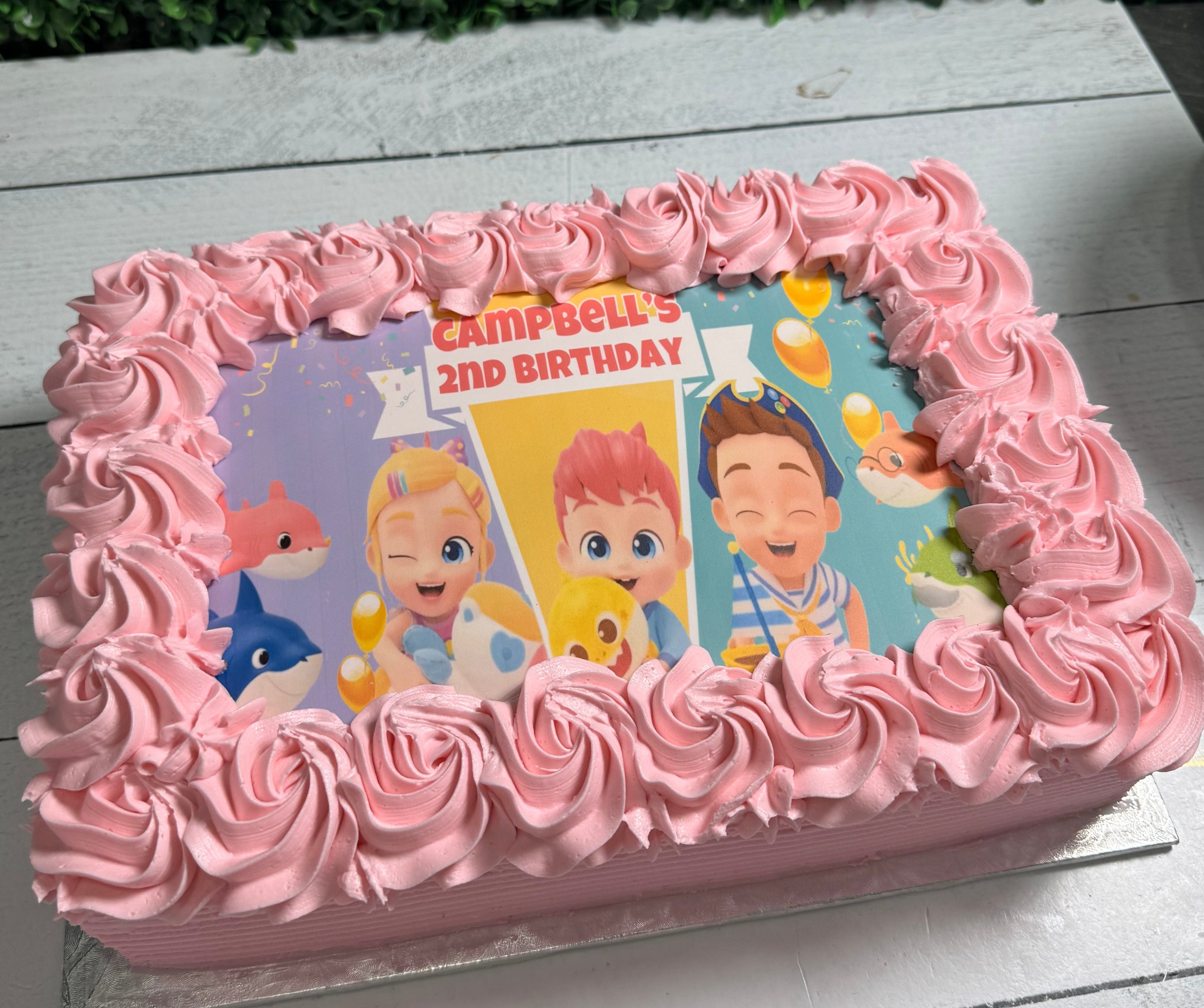Character themed sheet cakes